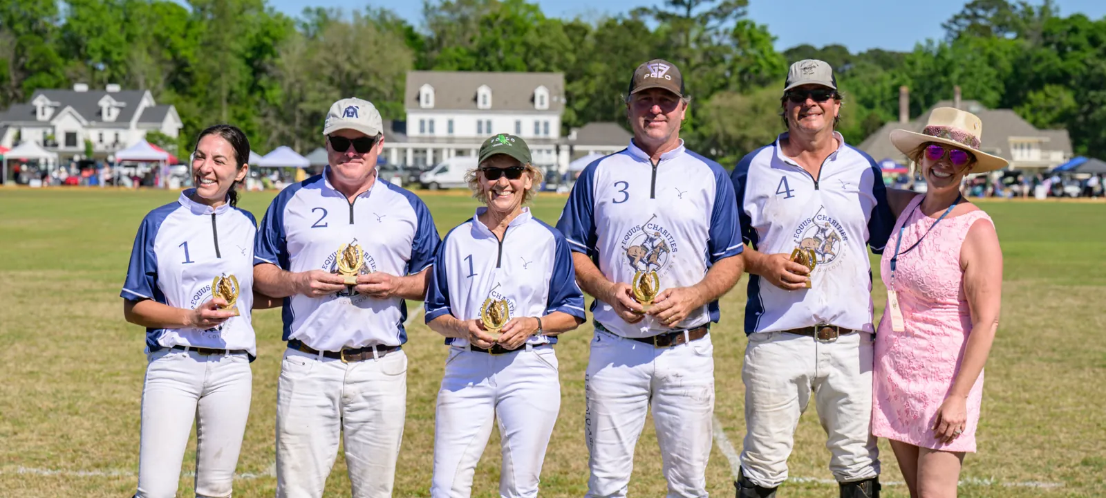 White team receiving trophies at the 2026 Rose Hill Charity Polo Match in Bluffton, SC